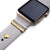 Series 4 Gold Apple Watch with sand Sport band and gold luxe glam stack with polished engraved gold 3mm ring and gold heart stud accessory band charm
