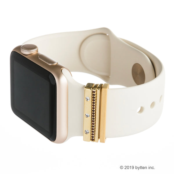 bytten gold monaco stack on gold Apple Watch with winter white sport band