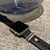 Bytten Africa Stack on gold Apple Watch with deep black sport band