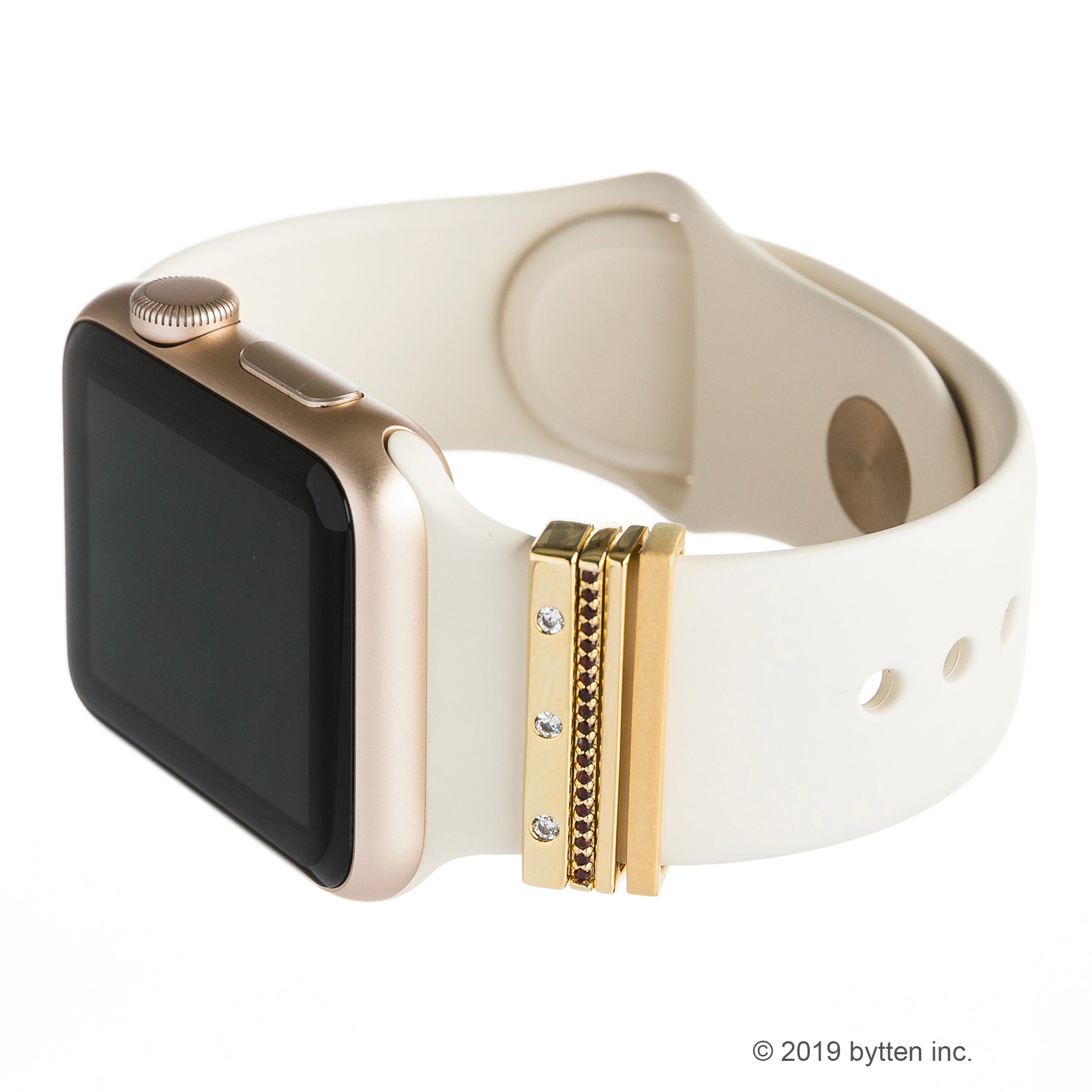 bytten gold monaco stack on gold Apple Watch with winter white sport band 