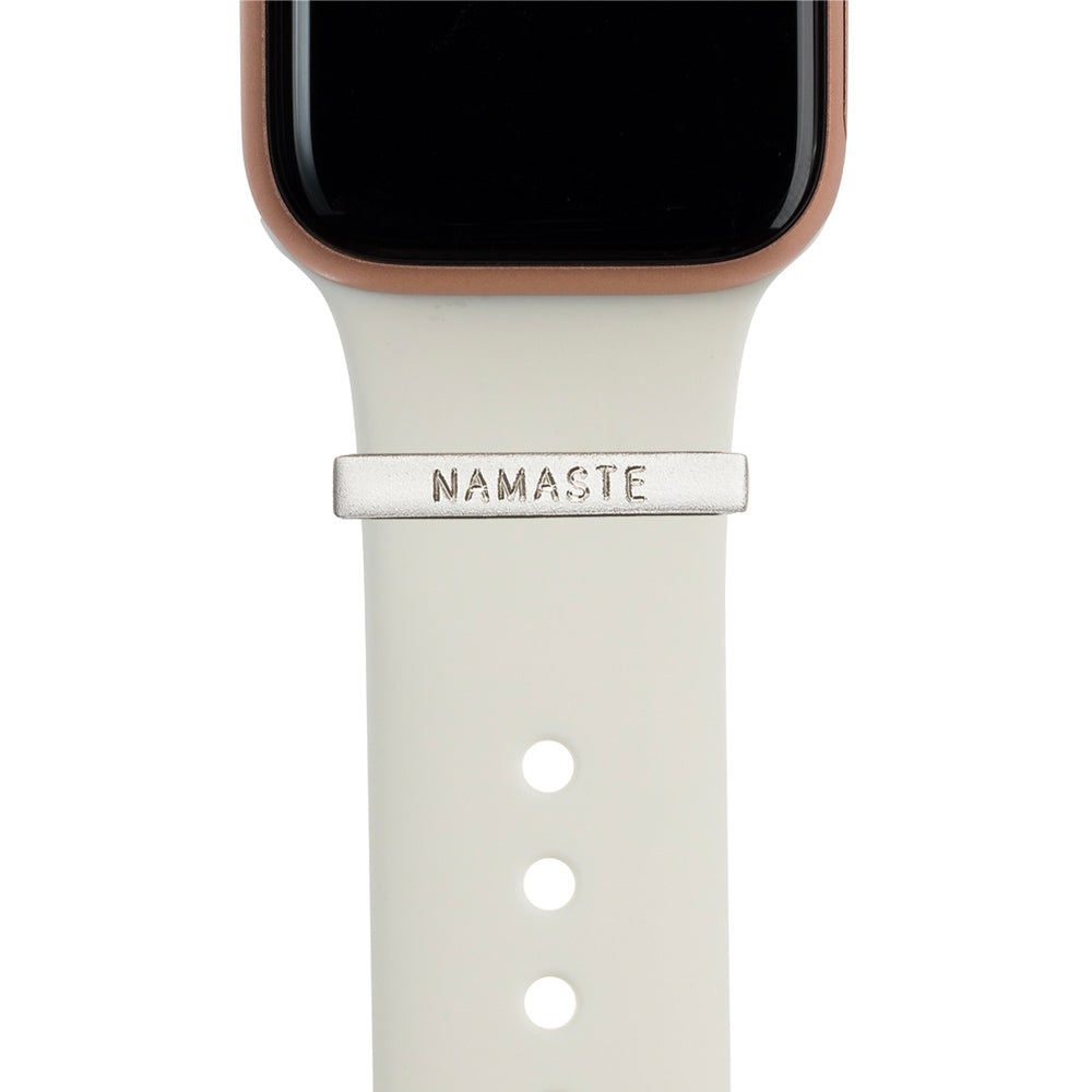 Gold Apple Watch with white Sport band and satin silver bytten 3mm engraved ring charm accessory